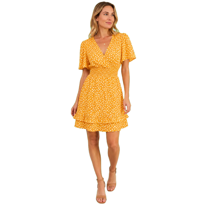 Harrow &amp; Quinn Willow Floral V-Neck Mini Dress in Marigold on model transparent hero image