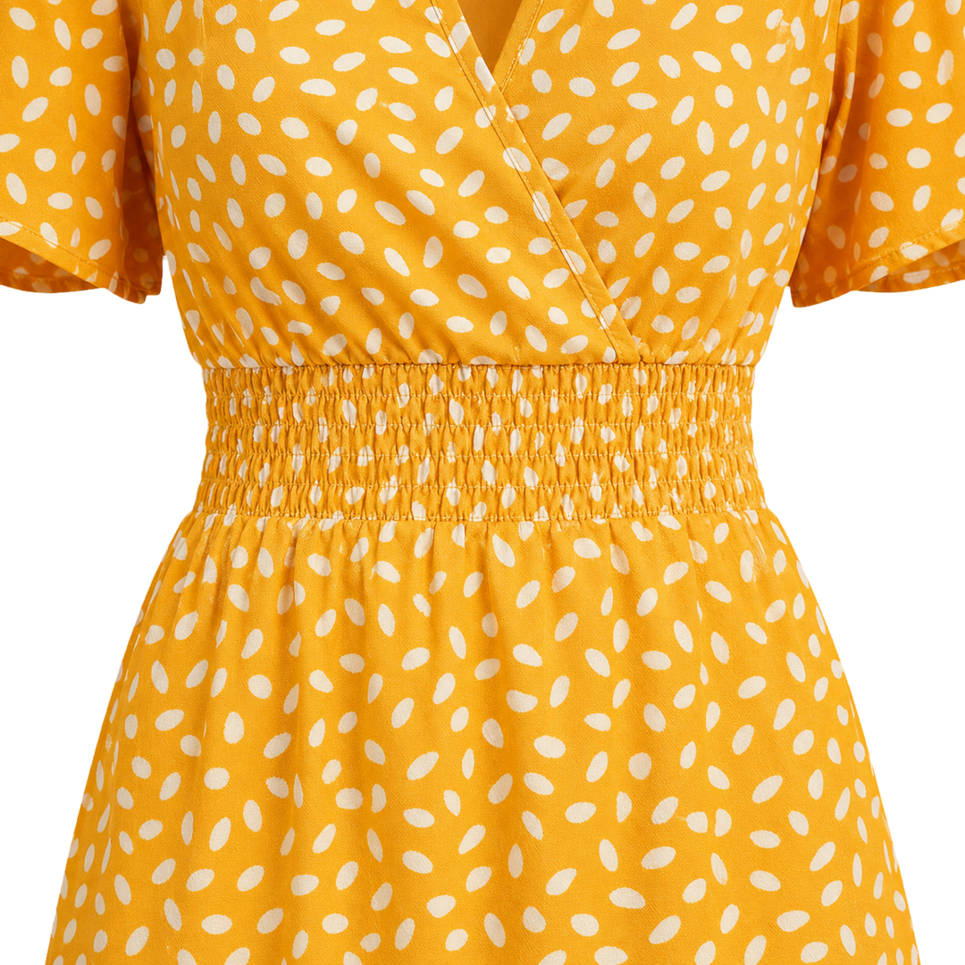 Harrow &amp; Quinn Willow Floral V-Neck Mini Dress in Marigold smocked waist and wrap bodice detail transparent background